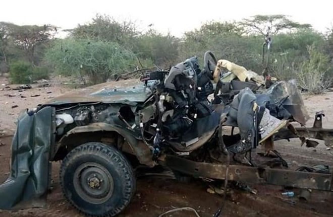 Photo taken on Oct. 12, 2019 shows a destroyed vehicle at the site of a blast in Garissa county, Kenya. A roadside blast killed at least 10 Kenyan paramilitary police officers in Garissa county along Kenya-Somalia border on Saturday, a security official said. (Photo by Chris Mgidu/Xinhua)